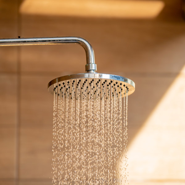 A Running Shower Highlighting Hot Water Heater Repair in Atlanta, GA