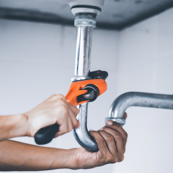 Professional team member of Quick Action Plumbers giving the plumbing service in Atlanta, GA.Â