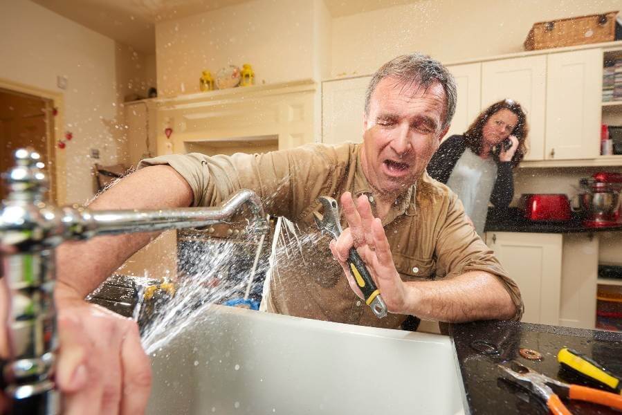 A Technician Fixes the Sink Faucet Showcasing Emergency Plumbing in Atlanta, GA