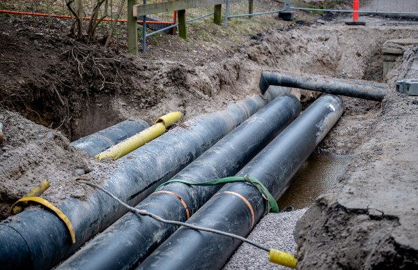 Underground sewer lines being installed