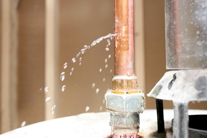 A close image of a leaking pipe needs a plumbing service in Atlanta, GA.Â